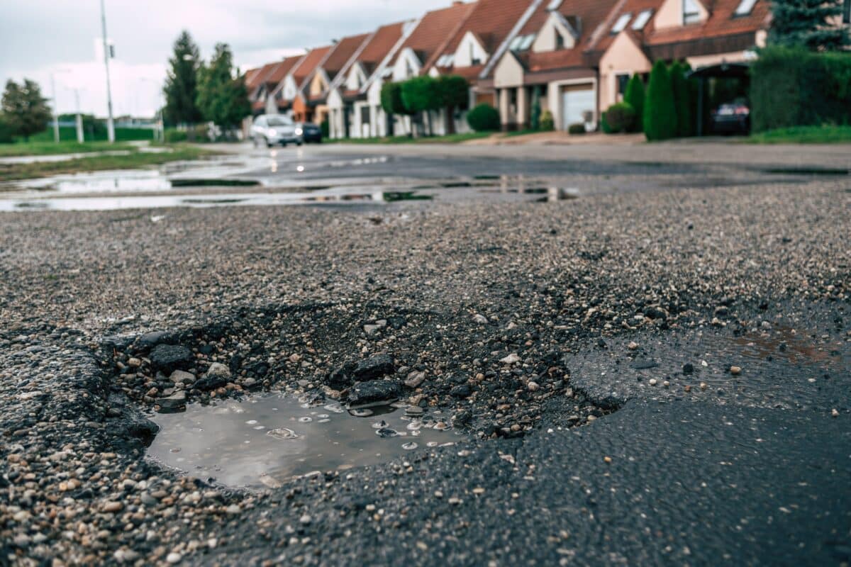 Water and excessive weight gradually causes a pothole in the road